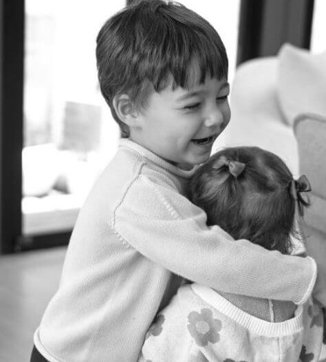 James Holt Joblon hugging his baby sister Elle Holt Joblon.